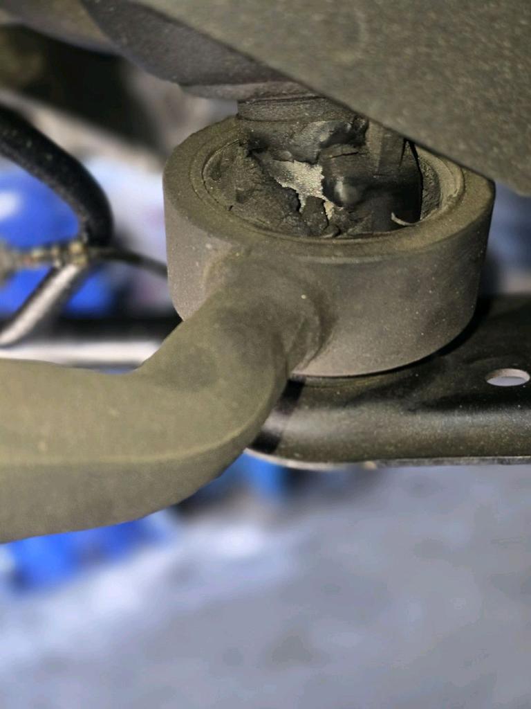Damaged engine mount bushing